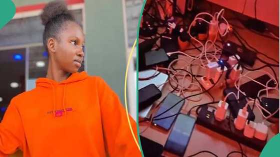 Lady shares video of boy's room where students troop in to charge phones after he bought generator