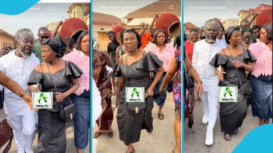 Papa Shee proudly carries Akosua Serwaa’s bag in town, fans react warmly