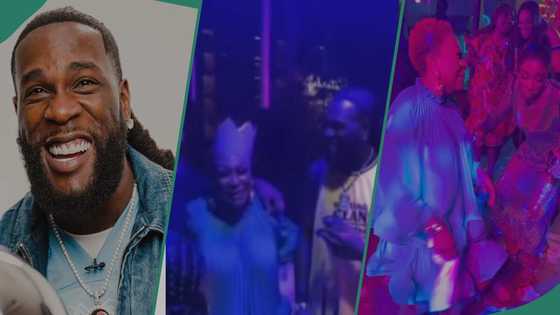 Burna Boy parties with his parents at Lagos nightclub, Phyno spotted with singer's sister in video