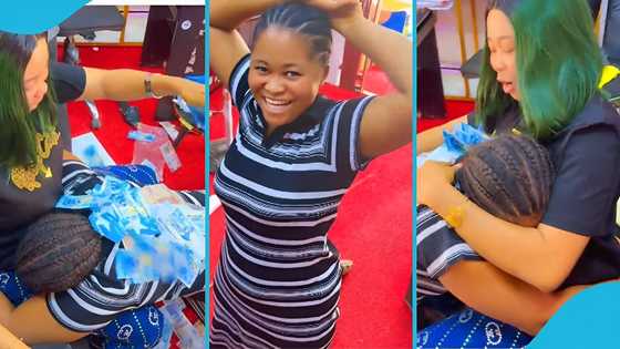 Ghanaian woman sprays cash on loyal employee, video warms hearts: "She deserves more"