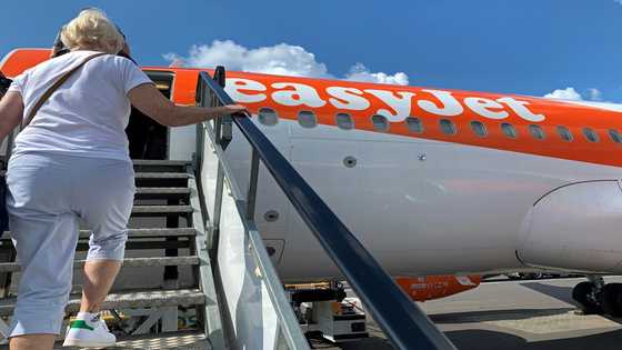 UK airline easyJet cuts losses on strong demand