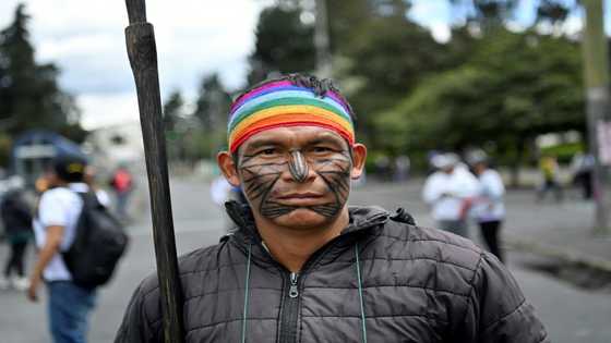 Indigenous Ecuadorans marched in central Quito Wednesday to call for a restart of negotiations suspended by the government more than two weeks into disruptive and often violent daily protests against rising living costs.
